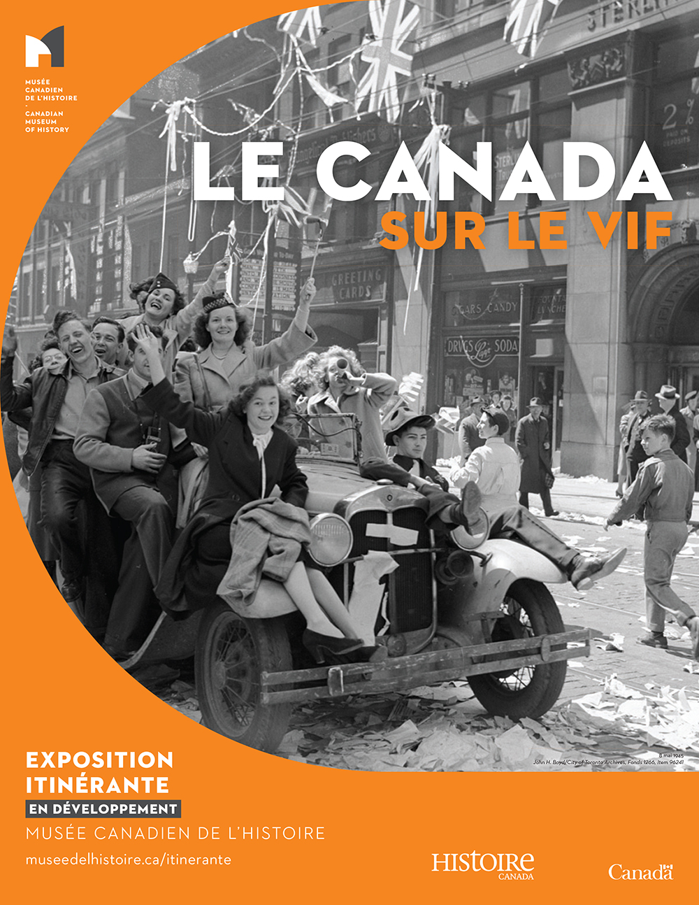This image shows a historic photograph with the exhibit title "Snapshots of Canada." 
